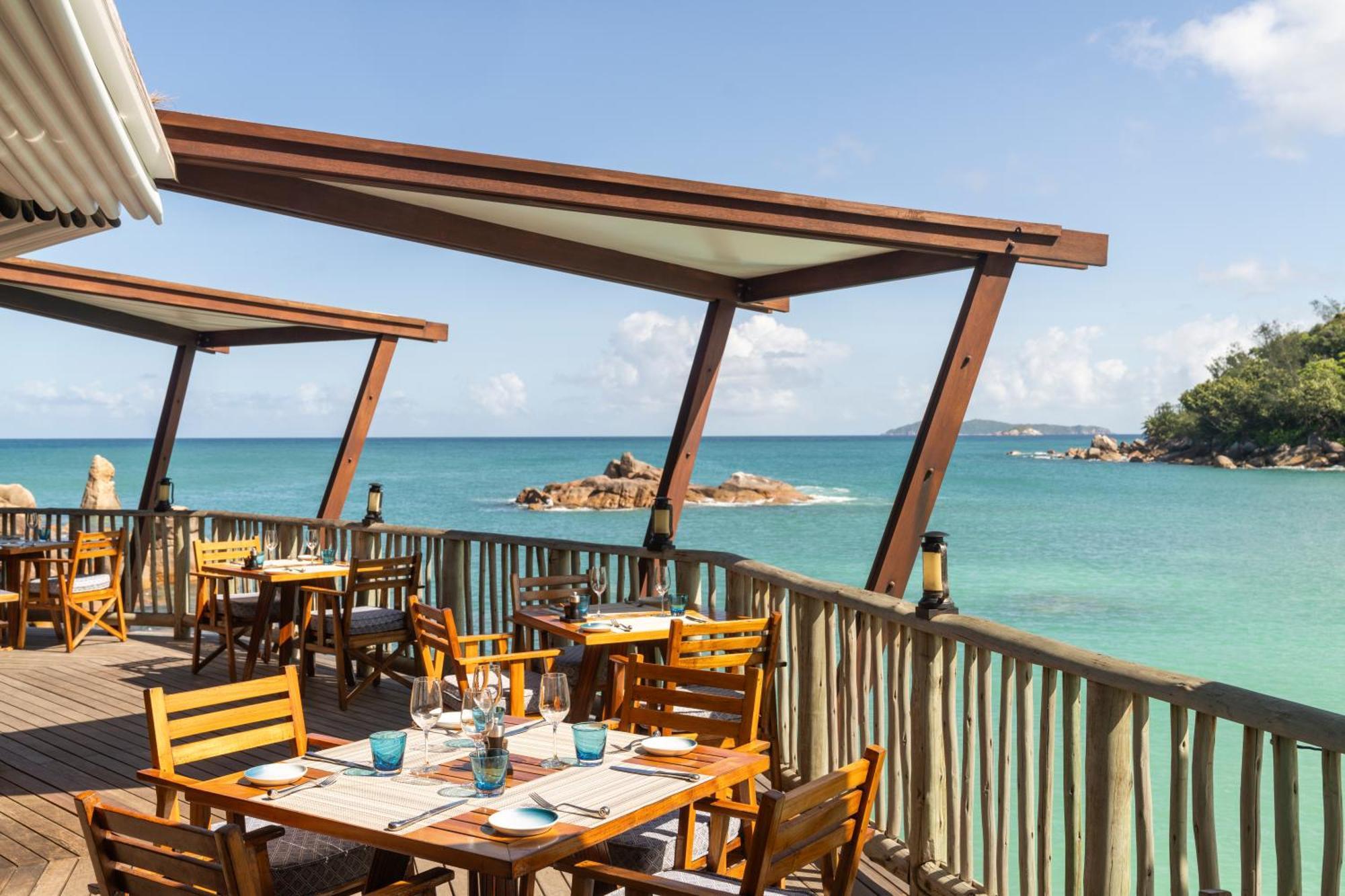 Constance Lemuria Grand Anse  Bagian luar foto The Deck at the Beach Club